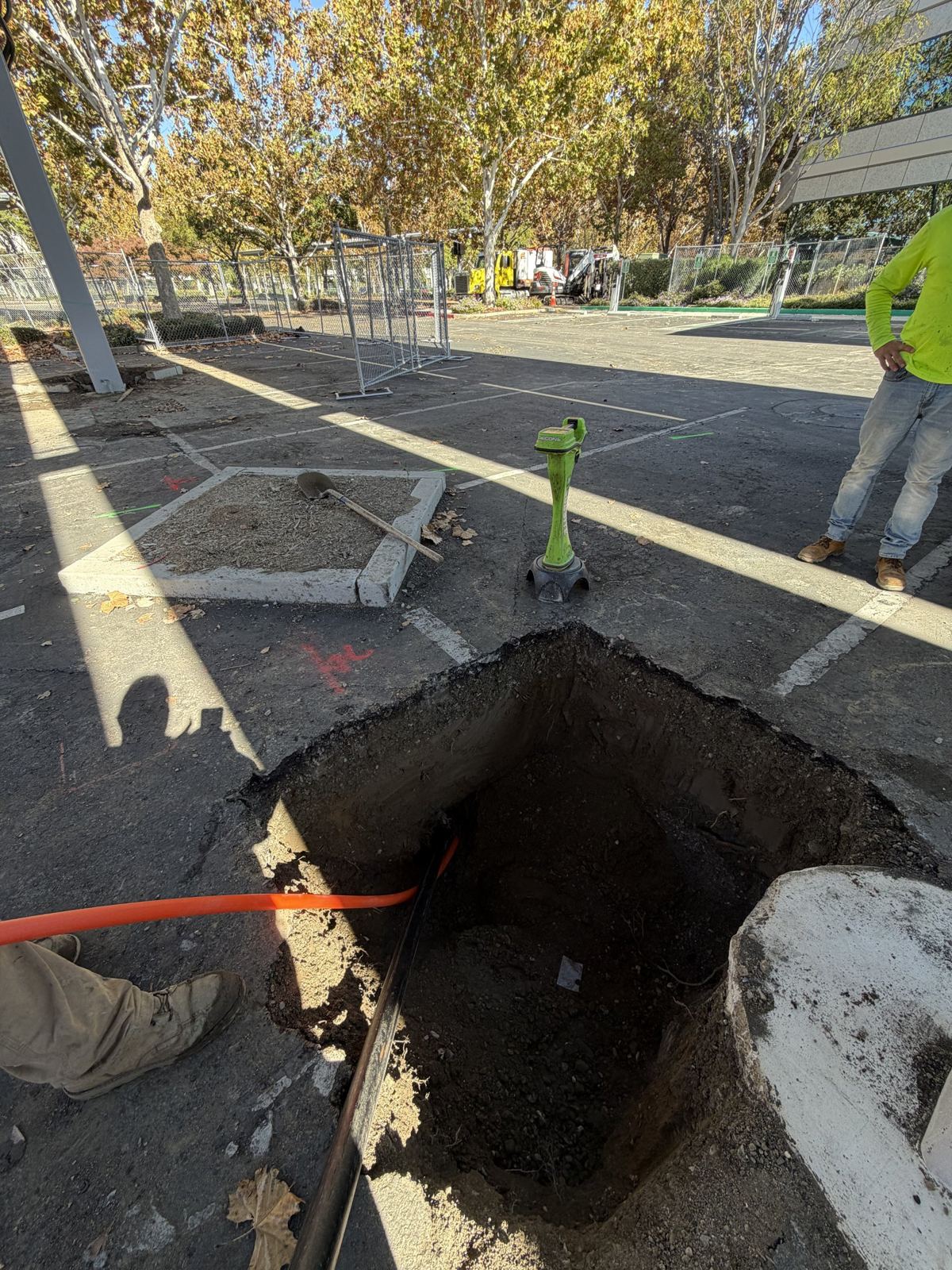 Excavation through parking lot asphalt