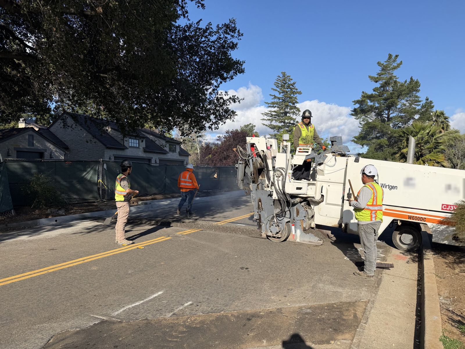 Grinding the street for final paving