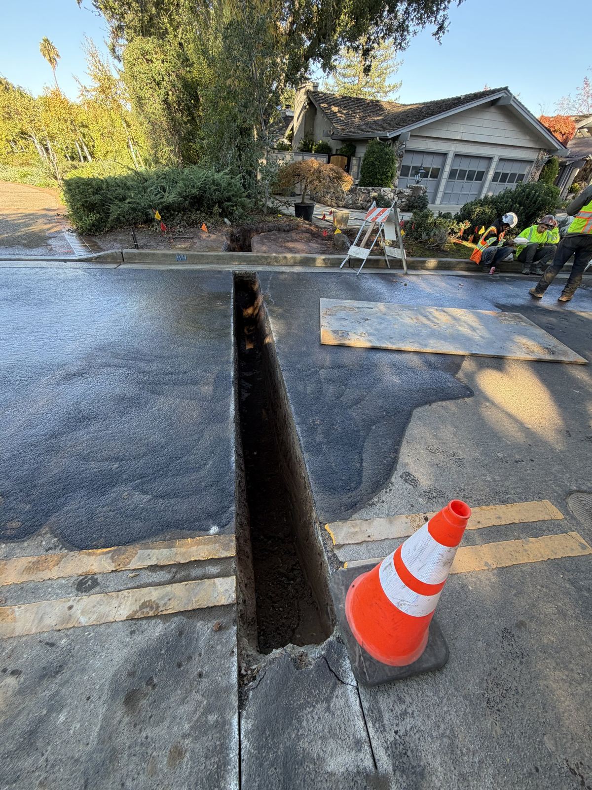 Sawcut utility trench across a residential street