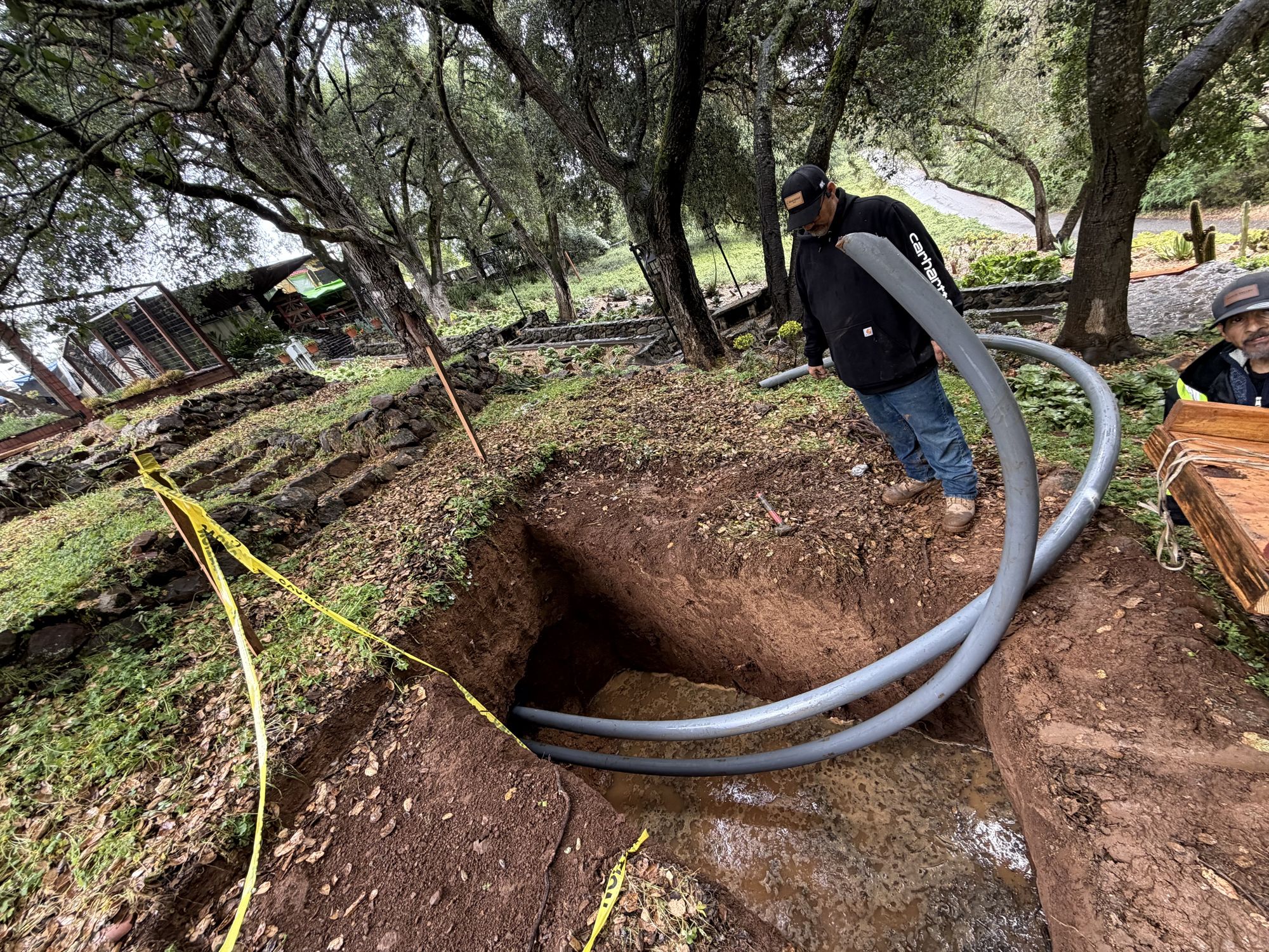 Pair of conduits going into the bore at the exit pit