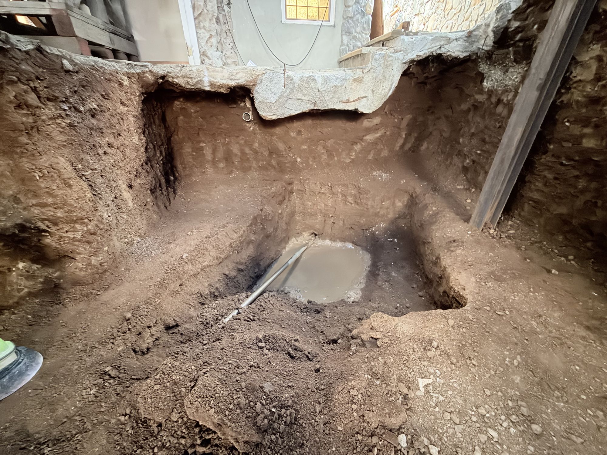 Interior bore pit inside the basement