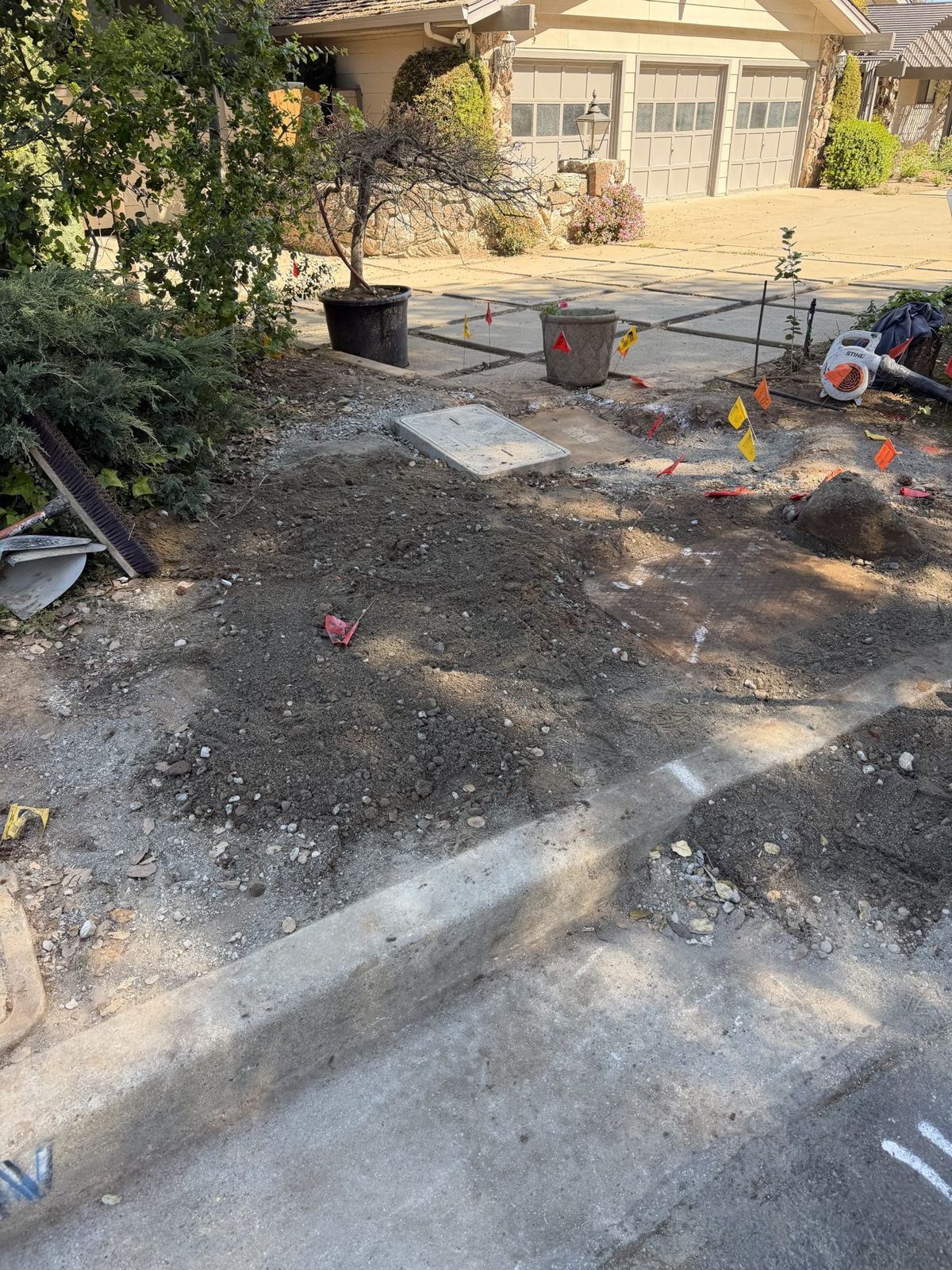 Residential driveway and landscaping left intact along a bore path